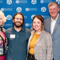 tom and marcia with a different couple at photo station